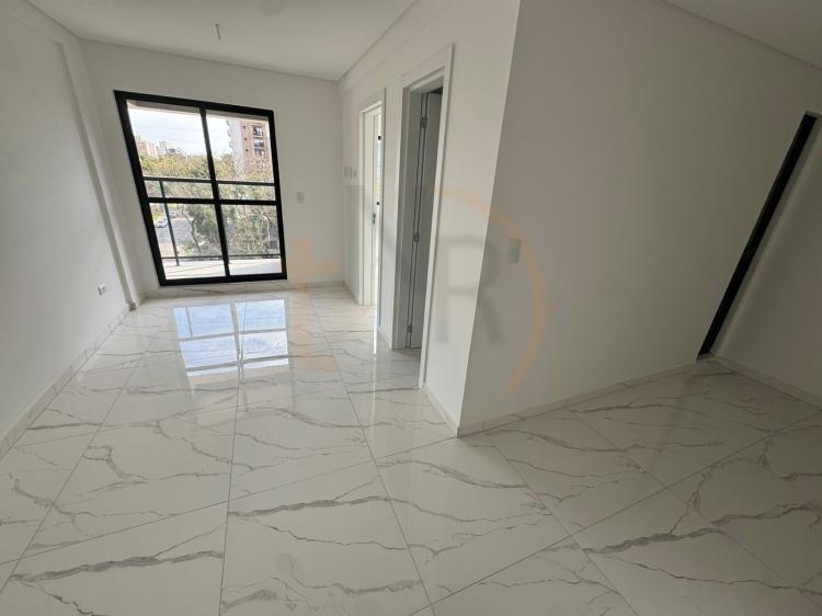 Apartamento de um dormitório com sacada com churrasqueira