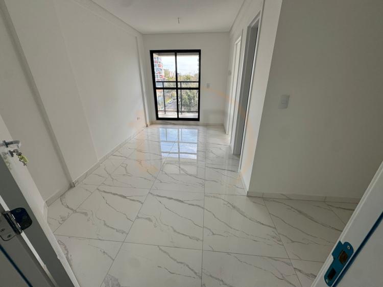 Apartamento de um dormitório com sacada com churrasqueira
